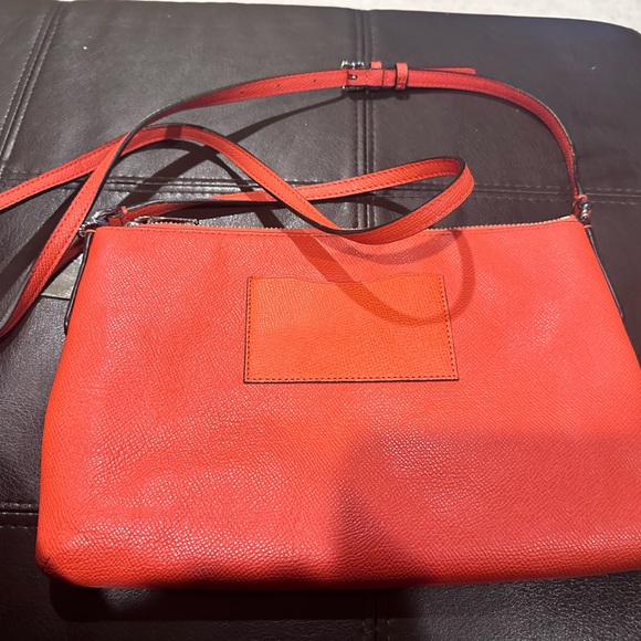 Authentic orange crossbody purse by Coach. - Picture 3 of 4